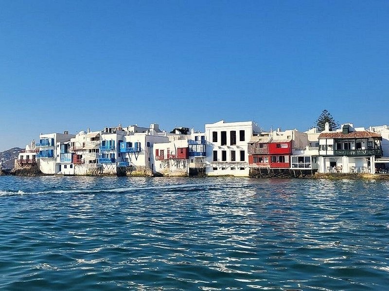 The Little Venice waterfront, with the sea breaking under the balconies