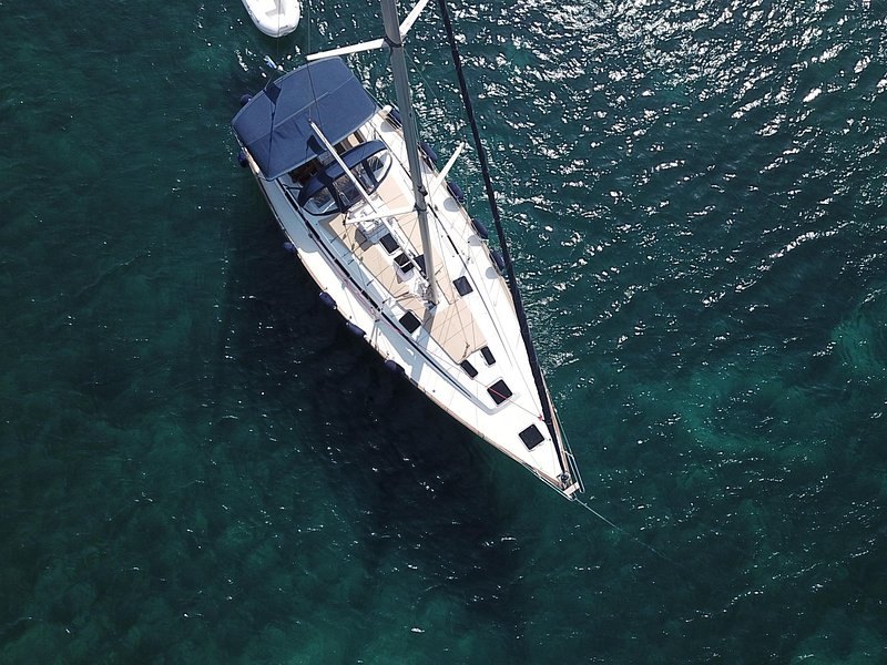 A sailing yacht under way on the deep blue of the Aegean